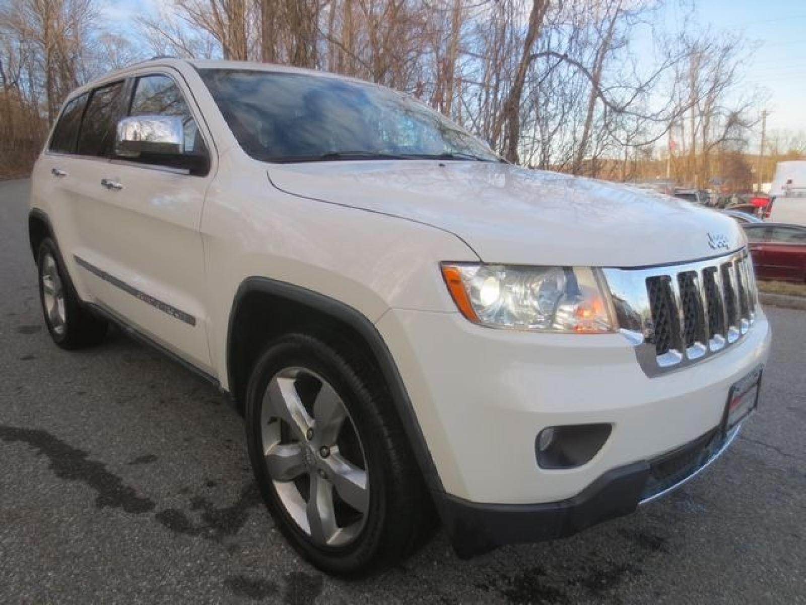 2011 White /Black Jeep Grand Cherokee Overland (1J4RR6GT1BC) with an 5.7L v8 engine, Automatic transmission, located at 270 US Route 6, Mahopac, NY, 10541, (845) 621-0895, 41.349022, -73.755280 - Photo #1